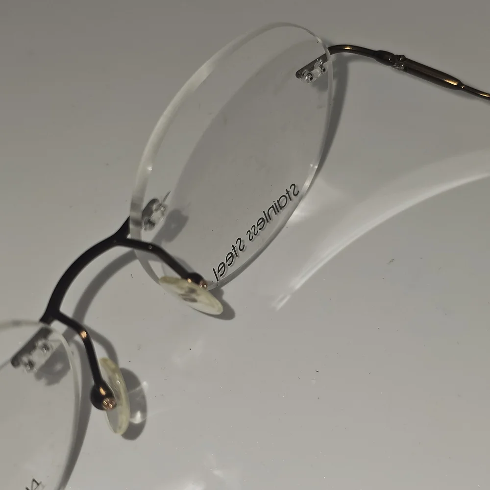 Naturally‎ Rimless NR 372 Eyeglasses Frame 50-17-135 Brown